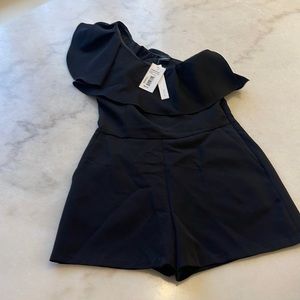 NWT AQUA black a symmetric ruffle romper. S